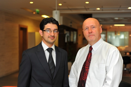 PROUD INTRUCTOR: Uzair Khan with his tutor David Thomasson (right), the Founder and Managing Director of Phoenix Financial Training.